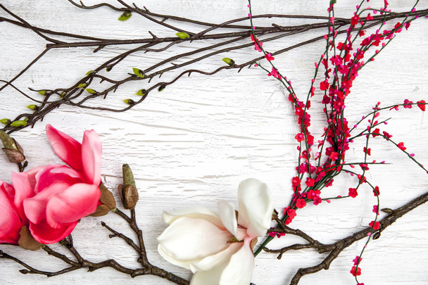 spring background with flowering branches on wooden background, top view   - Foto, Imagem