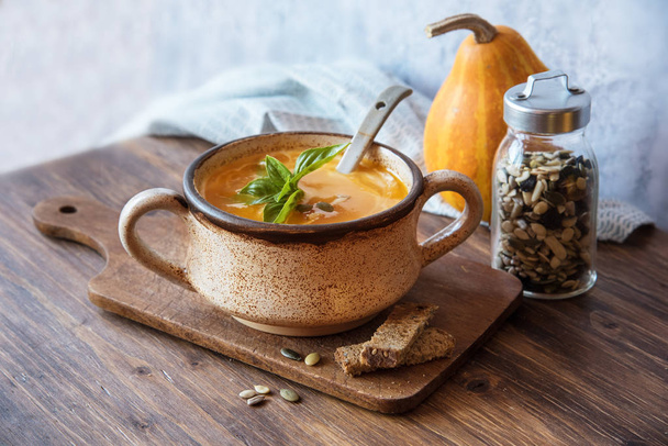 Tasty pumpkin soup, seasonal autumn food - Photo, Image