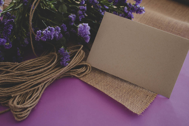Handmade wedding card, paper craft, purple background with flowers - Foto, Imagen