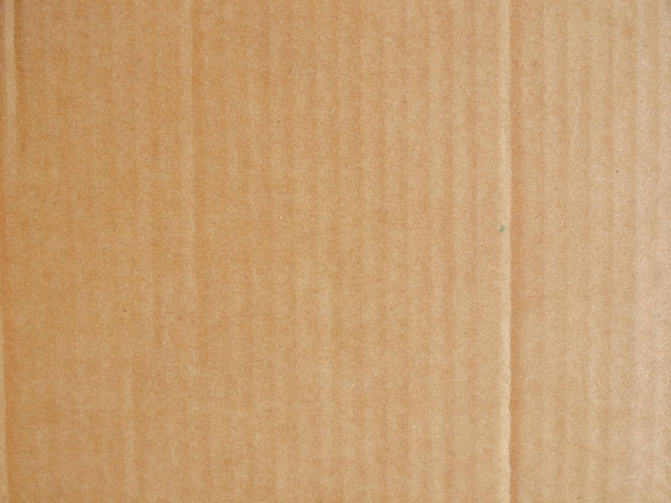 Brown cardboard paper useful as a background, soft pastel colour - Photo, Image