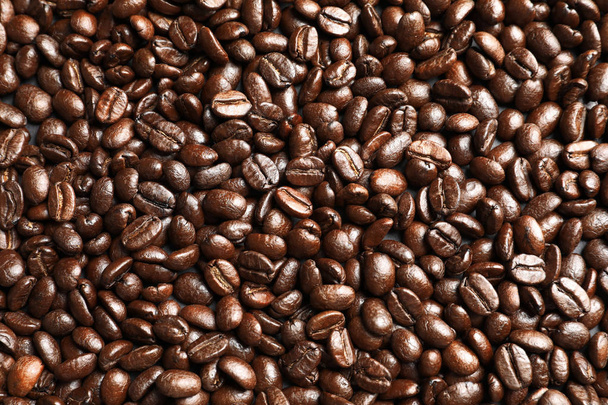 Roasted coffee beans as background, top view - Фото, зображення