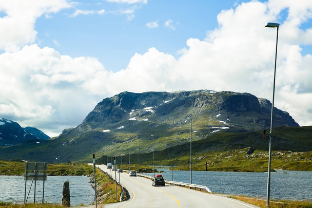 Norway-August 15, 2014 -  Road with cars in Norwegian rural place. - Foto, Bild