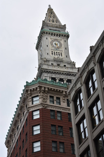 BOSTON, MA - JUN 16: Custom House Clock Tower in Boston, Massachusetts, as seen on Jun 16, 2018. The building joined the National Register of Historic Places in 1973. - Fotoğraf, Görsel