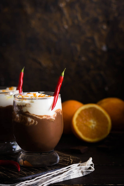 Warming hot chocolate with orange and chili for a cold season - Photo, Image