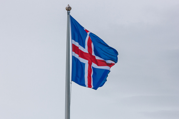 close-up shot of iceland flag in front of cloudy sky - Photo, Image