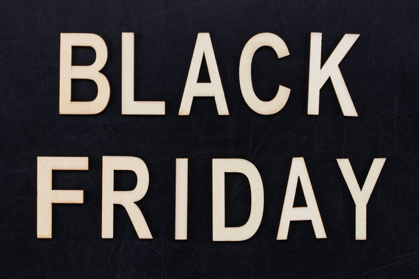 black Friday - text in wooden letters on blackBoard. Copy space. - Foto, immagini