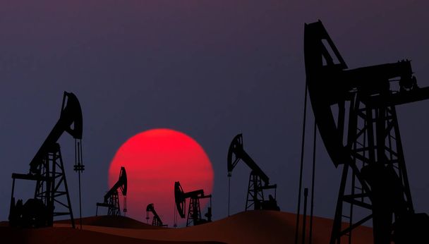 Silhouette des pompes à huile au coucher du soleil
 - Photo, image