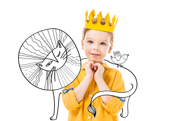 adorable boy in yellow crown with please gesture, isolated on white with drawn lion and bird  - Photo, Image