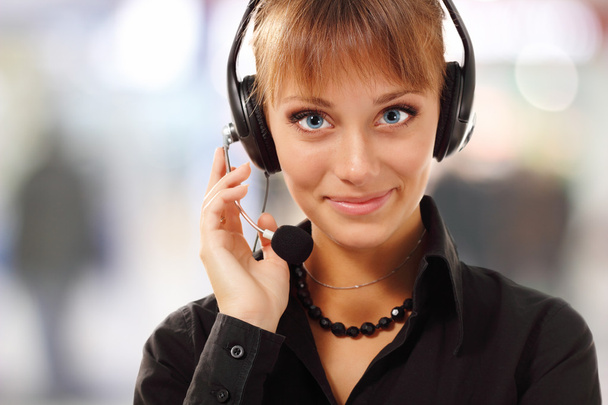 Support phone operator beautful young woman in headset at workpl - Fotó, kép