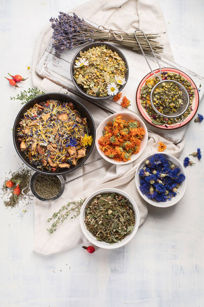 Various herbs and dried flowers for herbal medicine  - Fotó, kép