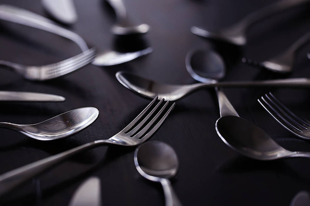 forks, spoons and knives on table, beautiful serving tableware  - 写真・画像