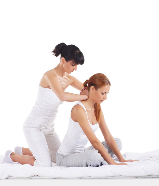 A young redhead woman on a Thai massage procedure - Photo, Image