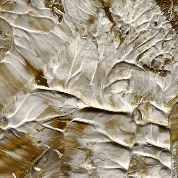 golden acrylic paint texture, abstract background - Photo, image