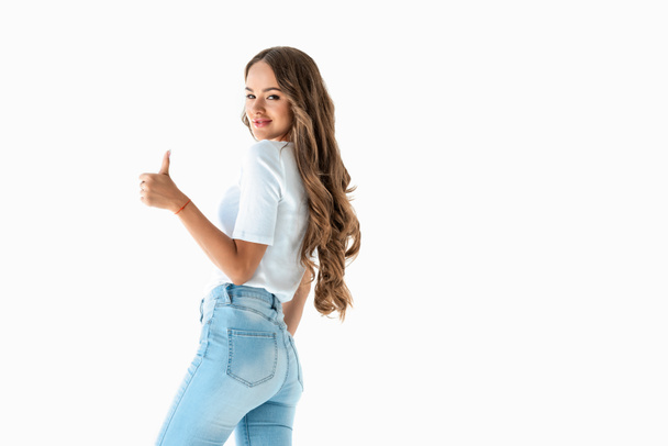 cheerful brunette girl showing thumb up, isolated on white - Foto, Imagem