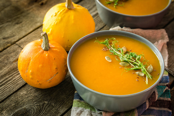 Pumpkin soup with pea micro green and seeds - Foto, Imagem