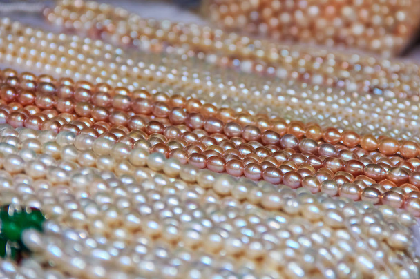 Strings of pearls at the tourist market in Gulangyu Island in China - Photo, Image