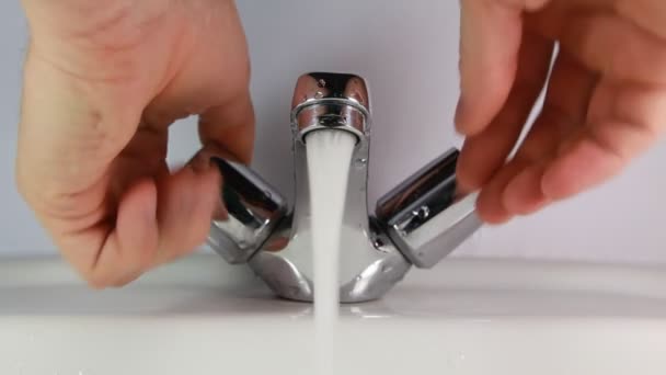 Water runs from a faucet - Footage, Video