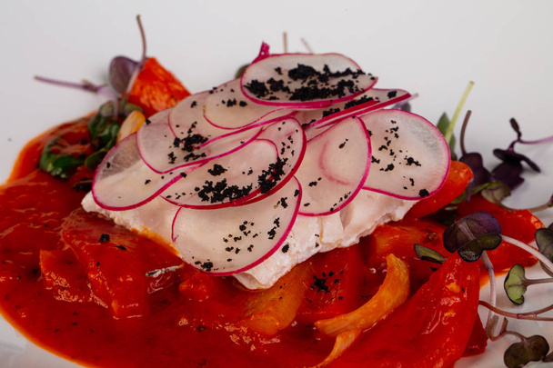 Steamed fish halibut with tomato sauce - Фото, зображення