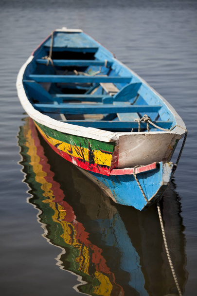 Traditional old hand painted Senegalese wooden rowing boat - Photo, Image