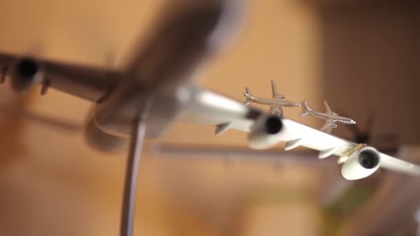 Model of the aircraft on the table silver cufflinks - Footage, Video