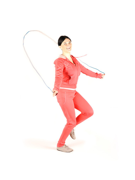 Fitnes, girl jumping over rope - Valokuva, kuva