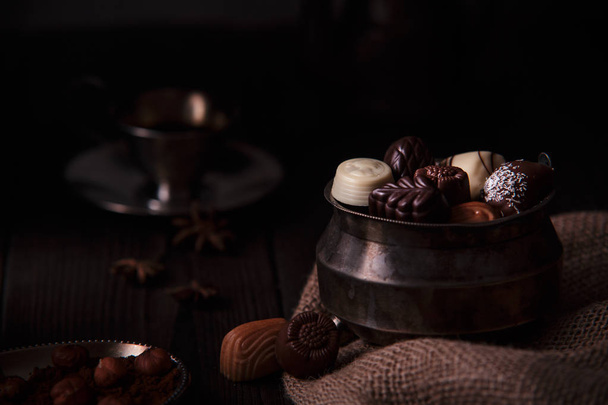 Delicious chocolate pralines. - Фото, изображение