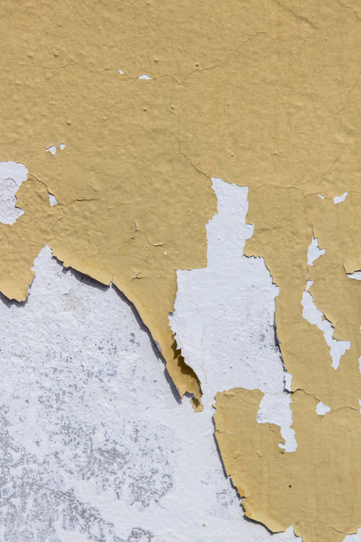 scratched weathered grey yellow building wall texture  - 写真・画像