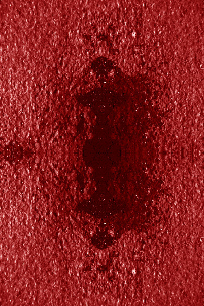 painted bright red stonewall surface with stains - Φωτογραφία, εικόνα