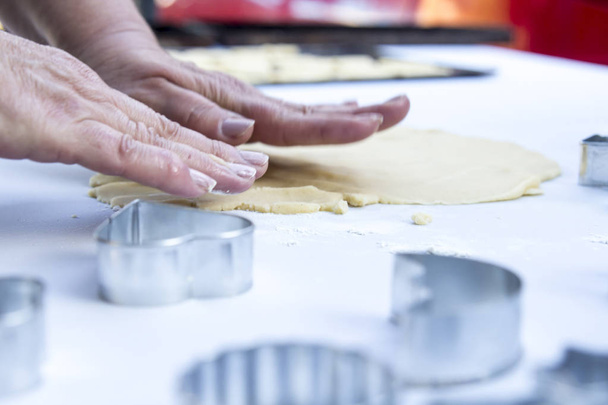 close up of person preparing dough at Aluminium Christmas Cookie Cutters - Φωτογραφία, εικόνα