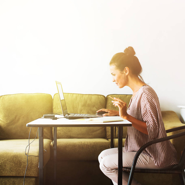 Young Beautiful Woman Working at Her Home Office Computer Internet Laptop Businesswoman Working by Home Table - 写真・画像