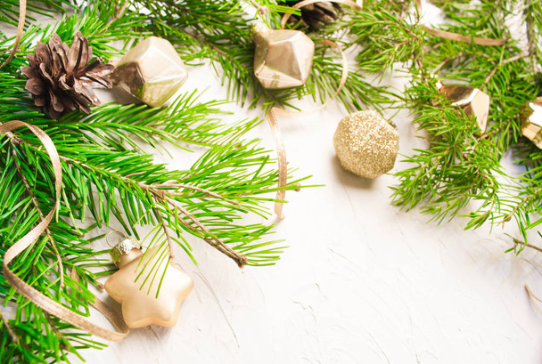 Christmas or New Year background: fir tree branches,  toys, decorations. Copy space - Foto, afbeelding