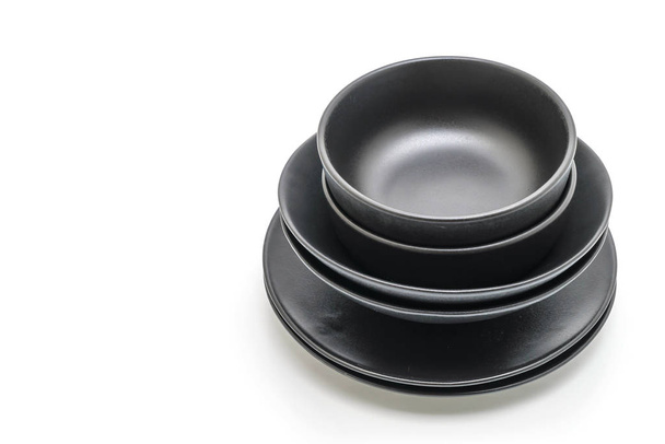 empty black plate and bowl isolated on white background - Zdjęcie, obraz