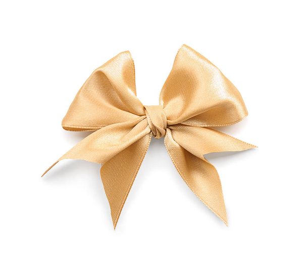 Beautiful bow made from golden ribbon on white background - Photo, Image
