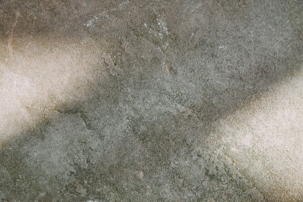 grey shabby textured stone with sunlight - Foto, imagen