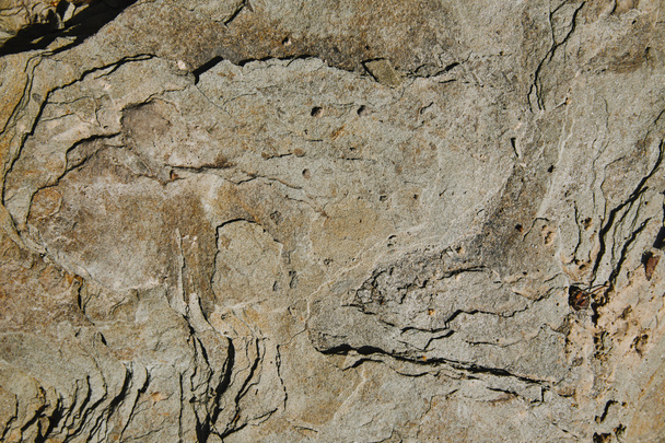 верхний вид коричневого грубого текстурного камня
 - Фото, изображение
