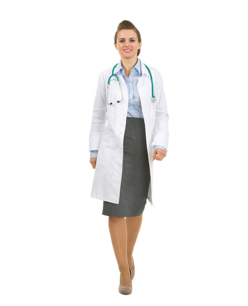 Full length portrait of medical doctor woman going straight - Foto, Imagem
