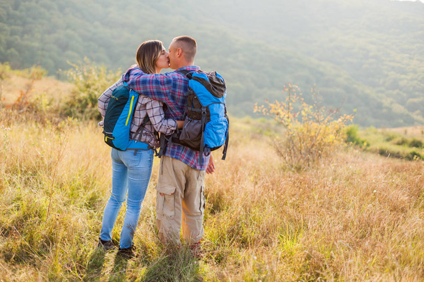 Happy couple is hiking in mountain. - Fotó, kép