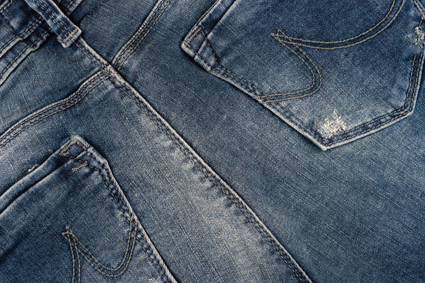 Jeans background texture,Denim jeans texture or denim jeans background. Abstract background, empty template.  Top view. - Zdjęcie, obraz