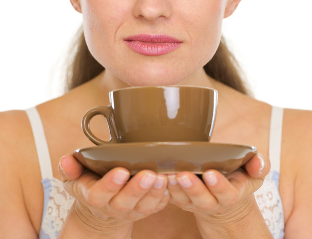 Cup of coffee in woman hands - Фото, зображення