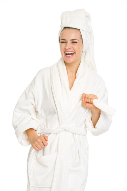 Portrait of happy young woman in bathrobe - Photo, Image