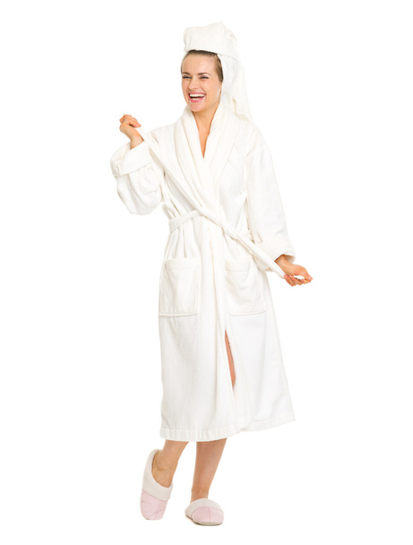 Full length portrait of woman taking off bathrobe. Rear view - Foto, imagen