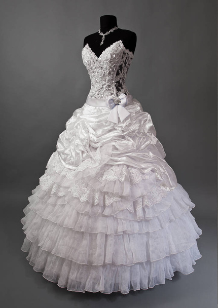 White wedding dress on a mannequin. - Zdjęcie, obraz