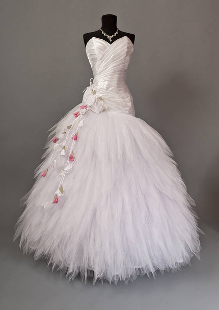 White wedding dress on a mannequin. - Fotó, kép