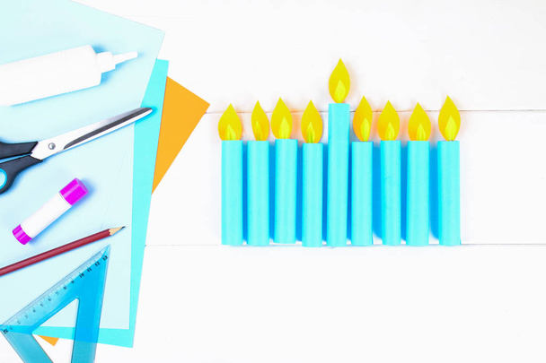 DIY. A paper menorah with his own hands made of paper. Menorah for the Jewish holiday Hanukkah. Handmade for the child - Fotografie, Obrázek