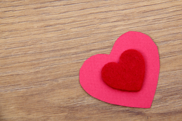 Heart symbol on a wooden background - Fotó, kép