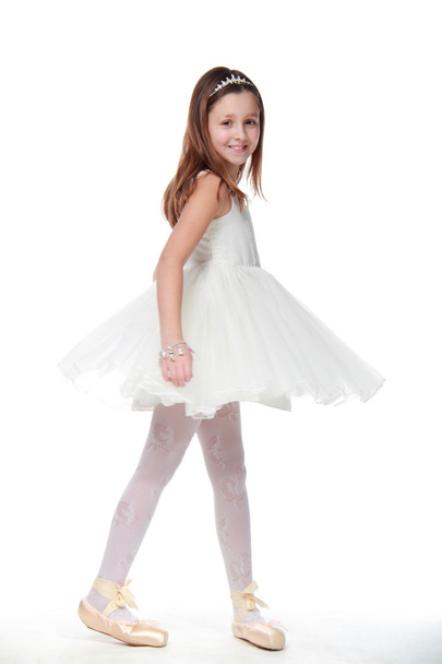 Young girl in a dancing costume and pointe - Foto, afbeelding