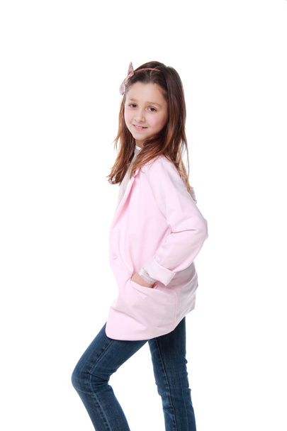 Little girl in casual wear on white background - Zdjęcie, obraz