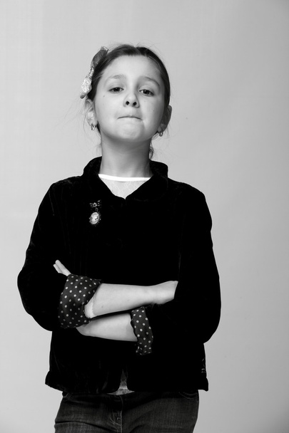 Black and white close-up portrait of smiling pretty little girl - Fotó, kép