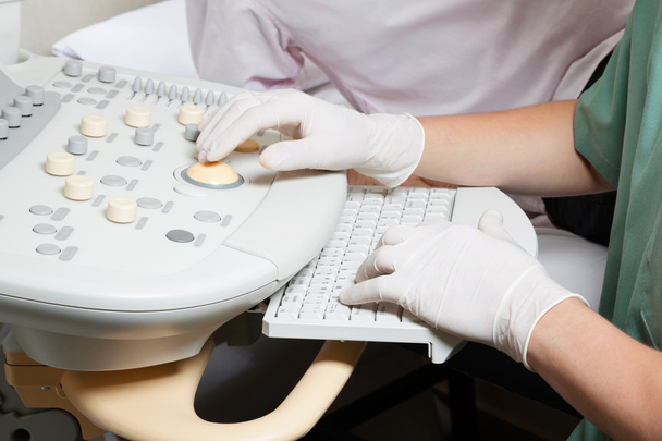 Technician Operating Ultrasound Machine - Photo, Image