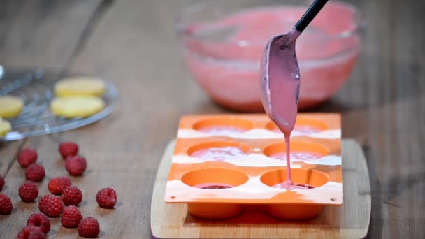 Making French raspberry mousse cake. Home confectionery. - Footage, Video
